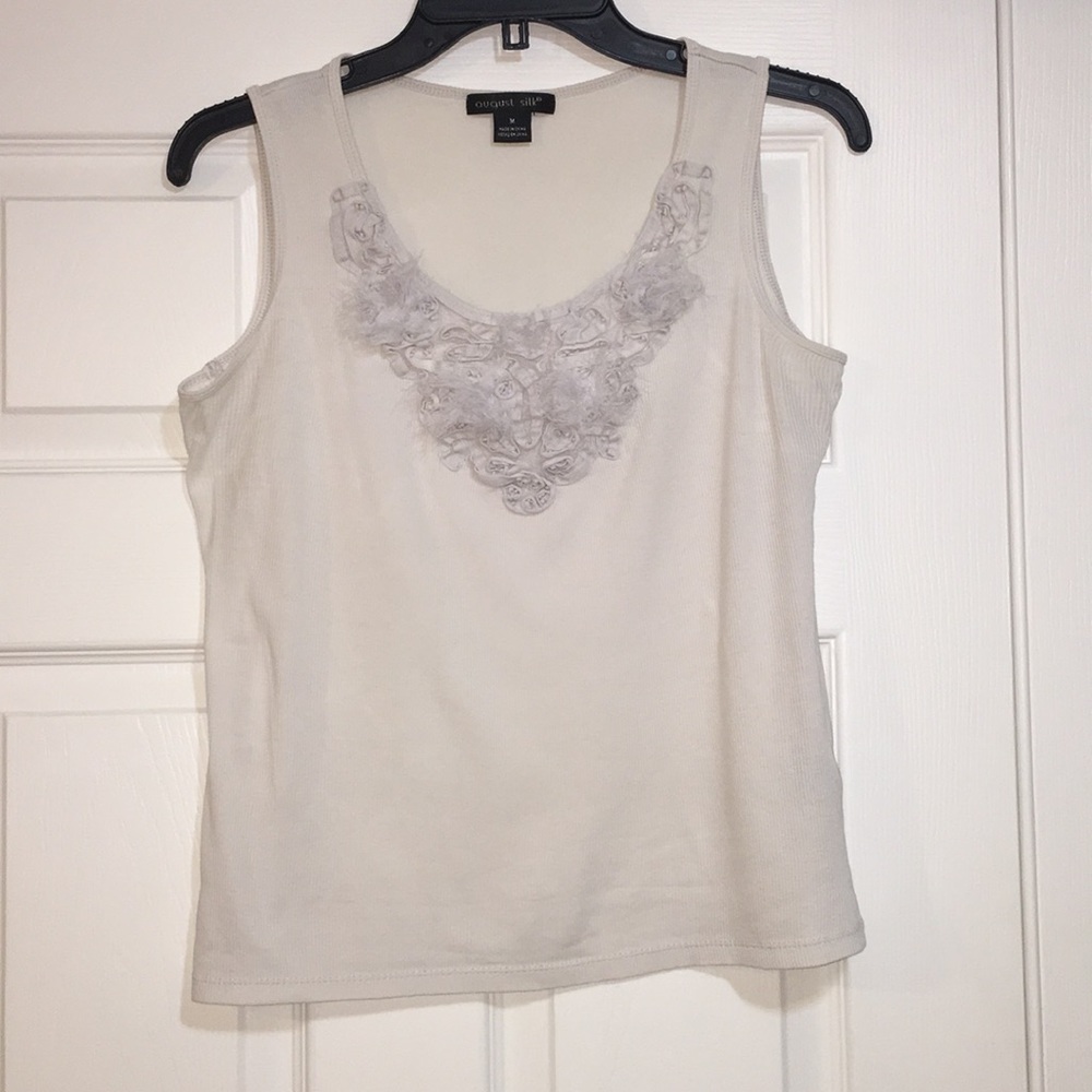 Top with an interesting neckline design
